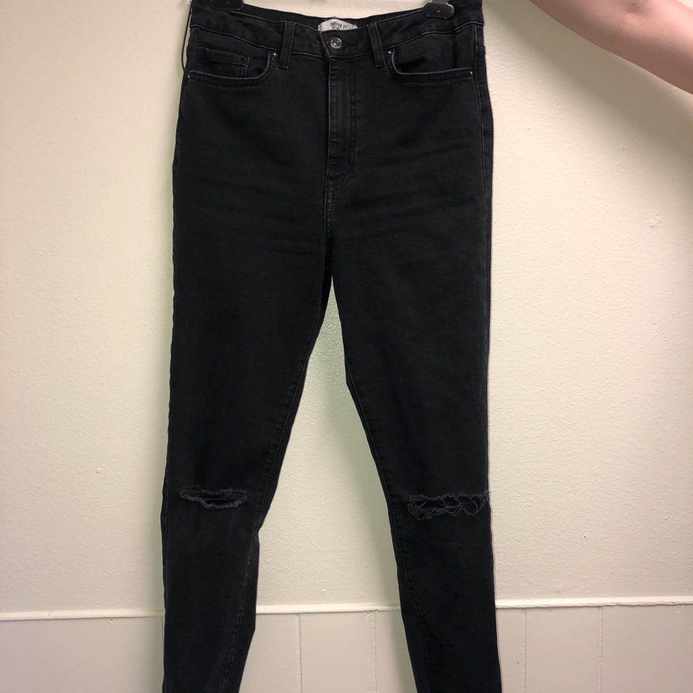 High waisted black jeans with knee holes